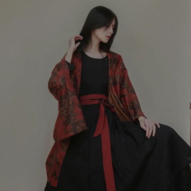 woman wearing a red floral kimono cardigan jacket