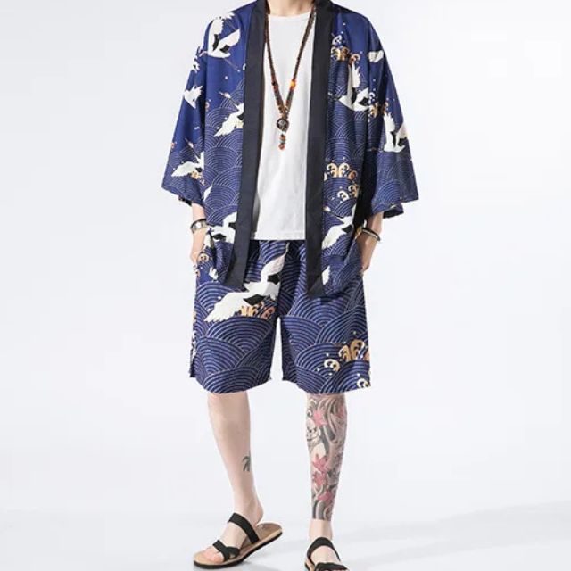 Man wearing open-front navy haori jacket and matching crane print shorts — Japanese-style summer outfit