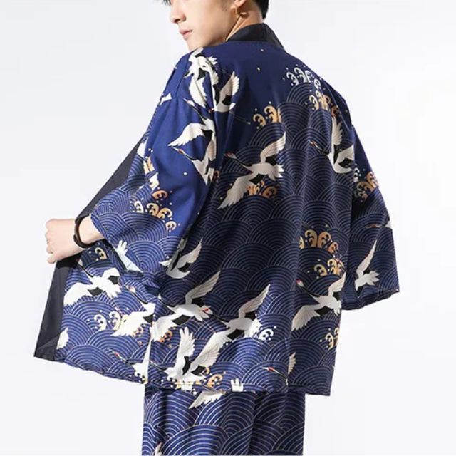 Man wearing open-front navy haori jacket and matching crane print shorts — Japanese-style summer outfit