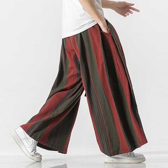 Striped hakama pants with wide leg fit in red and brown tones