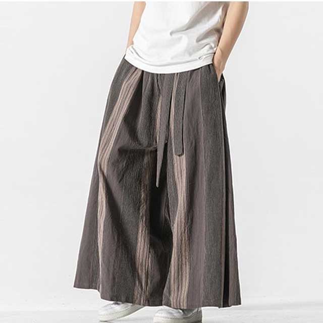 Striped hakama pants with wide leg fit in red and brown tones