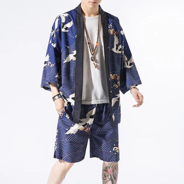 Man wearing open-front navy haori jacket and matching crane print shorts — Japanese-style summer outfit