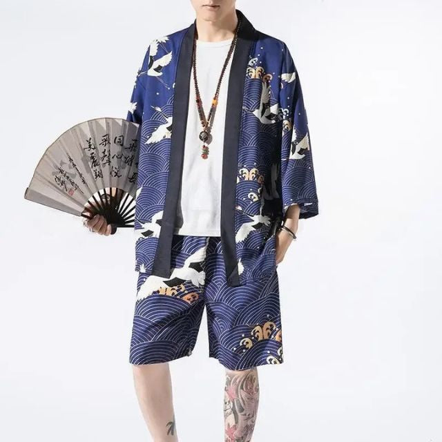 Man wearing open-front navy haori jacket and matching crane print shorts — Japanese-style summer outfit
