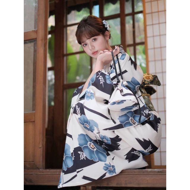 Japanese kimono dress with blue floral pattern and traditional wide sleeves
