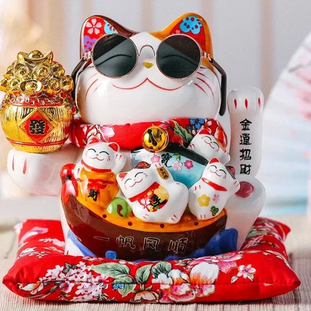 Japanese Lucky Cat ceramic decor with raised paws and colorful details, inspired by feng shui symbolism - eiyo kimono