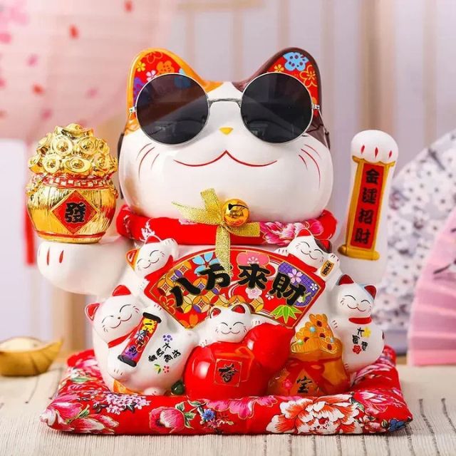 Japanese Lucky Cat ceramic decor with raised paws and colorful details, inspired by feng shui symbolism - eiyo kimono