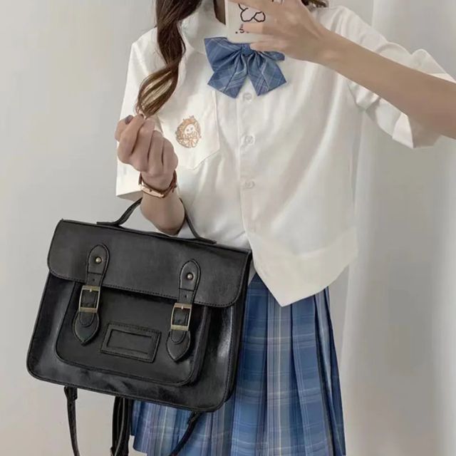 Japanese school bag with structured design and shoulder strap styled with Japanese school uniform - eiyo kimono