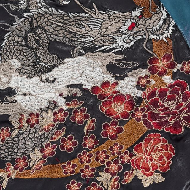 Embroidered teal sukajan jacket with dragon design on satin sleeves by Eiyo Kimono